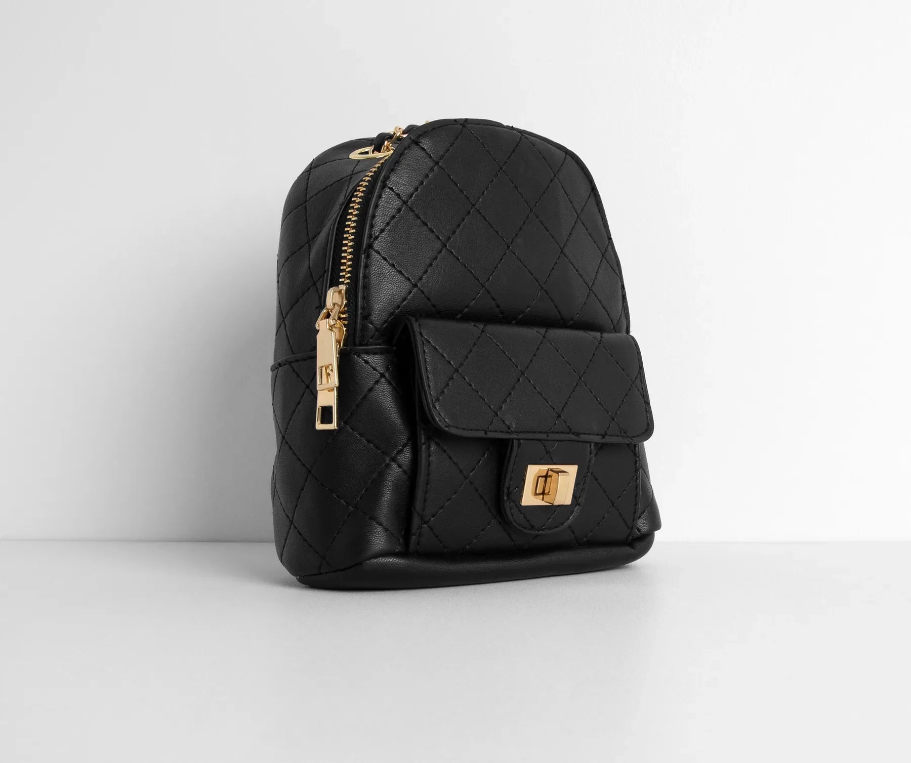 Day To Night Quilted Chain Backpack